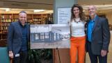 Avi Satt, from left, CEO of Encore Healthcare Services, shows a rendering of a planned convenience store where the north library of the Encore Village of Schaumburg retirement community is now. With him are Vice President of Operations Chantal Cornfield and Executive Director Mike Flynn.