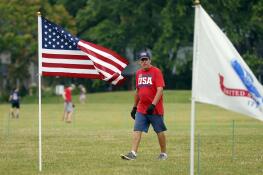 Rudy Keller oversees the setup for the Wheaton Field of Honor Saturday morning. The patriotic display features 2,000 American flags posted in Seven Gables Park.