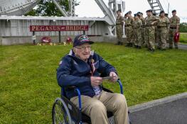 World War II veteran Bud Berthold, 104, of Fox River Grove attends a service at the Pegasus Bridge memorial in Benouville, Normandy, France on Wednesday. He’s among the veterans from across the United States as well as Britain and Canada in Normandy this week to mark 80 years since the D-Day landings that helped lead to Hitler's defeat.
