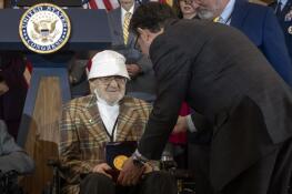 Republican House Speaker Mike Johnson of Louisiana, right, presents Ghost Army member Bernie Bluestein of Hoffman Estates with a medal during a ceremony to honor members of the secret World War II unit with the Congressional Gold Medal on Capitol Hill in Washington, D.C., in March.