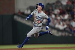 Chicago Cubs' Pete Crow-Armstrong rounds the bases after hitting a triple in the eighth inning of a baseball game against the Atlanta Braves Wednesday, May 15, 2024, in Atlanta. (AP Photo/John Bazemore)