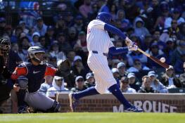 Chicago Cubs' Pete Crow-Armstrong hits a two-run home run during the sixth inning of a baseball game against the Houston Astros in Chicago, Thursday, April 25, 2024. (AP Photo/Nam Y. Huh)
