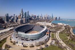 An aerial view of Soldier Field looking north toward the Chicago skyline.