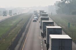Haze caused by smoke from Canadian wildfires blowing over the upper Midwest was visible along I-88 west of Elburn. The unprecedented wildfires, which scientists say are in line with the science behind global warming, pushed Chicagoland’s air quality to unhealthy levels.