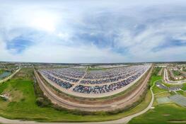 A 360-degree panoramic drone photo shows the thousands of cars stored in the Cash For Cars lot in Elgin on April 22.