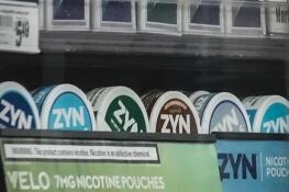 Containers of Zyn, a Phillip Morris smokeless nicotine pouch, are displayed for sale among other nicotine and tobacco products at a newsstand in New York. The product has been making big headlines, sparking debate about whether new nicotine-based alternatives intended for adults may be catching on with underage teens and adolescents.