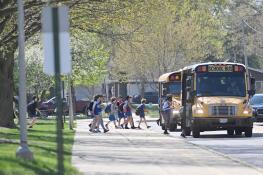 Students board buses after school on Thursday at West Chicago Elementary District 33’s Leman Middle School. The district has seen a 27.8% decline in enrollment over the past decade, according to figures released by the state last week.