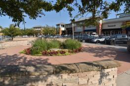The commons area in the heart of the Geneva Commons shopping center, which now has a new owner.