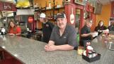 Chris Marston at Legends Pizza in Carol Stream with his crew behind the counter.