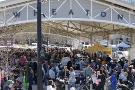 People flock to opening day of the downtown Wheaton French Market.