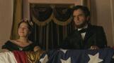 Mary Todd Lincoln (Lily Taylor) and President Abraham Lincoln (Hamish Linklater) attend the theater in "Manhunt" on Apple TV+.