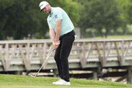 Taylor Pendrith hits onto the 18th green during the third round of the Byron Nelson golf tournament in McKinney, Texas, Saturday, May 4, 2024. (AP Photo/LM Otero)