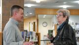 Bill Nienburg, left, chats with Downers Grove Library Board Trustee Marti Sladek during an event in February at the library. The Downers Grove Village Council last week removed Nienburg from the library board.