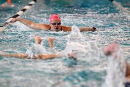 Tierney Larson of Arlington Heights practices with the Elgin Blue Wave masters swim team at the Centre of Elgin pool.