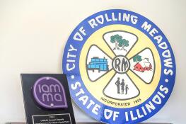 Officials at Rolling Meadows City Hall are showing off new hardware: the Innovative Community Program in Illinois Government Award, given by the Illinois Association of Municipal Management Assistants, for the city's new unlimited paid time off policy.