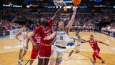 Marquette's Tyler Kolek (11) goes up for a basket against North Carolina State's Mohamed Diarra (23) during the second half of a Sweet 16 college basketball game in the NCAA Tournament in Dallas, Friday, March 29, 2024. North Carolina State won 67-58. (AP Photo/Julio Cortez)