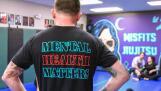 Brad Edmondson, the owner and operator of The Misfits Jiujitsu of St. Charles, wearing one of his Misfits T-shirts reading “Mental Health Matters."