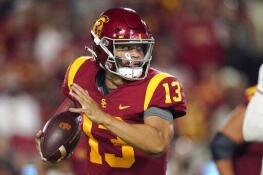 Southern California quarterback Caleb Williams runs the ball during the first half of an NCAA college football game against Fresno State Saturday, Sept. 17, 2022, in Los Angeles. (AP Photo/Mark J. Terrill)