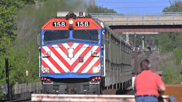 A Metra train from Chicago pulls into the Geneva station on Tuesday. The General Assembly is considering rolling Metra, Pace and the CTA into one mega agency.