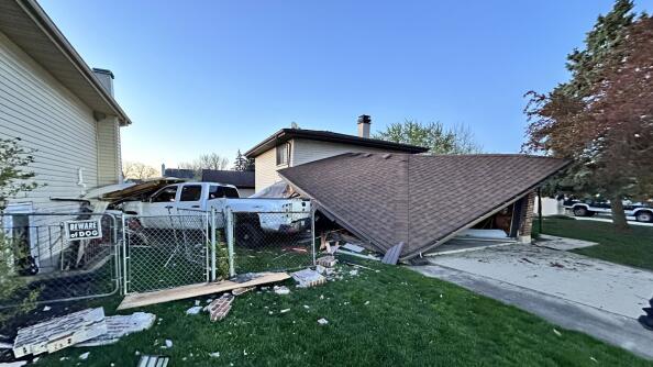 Authorities say this pickup truck crashed into two Bartlett homes last month when its driver was attempting to flee from police. No one inside the homes was injured.