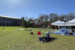 Tents, flags and other supplies remain Tuesday at Deering Meadow on Northwestern University's campus in Evanston, a day after the university and protest organizers announced an agreement which largely ended anti-war demonstrations that have lasted days.