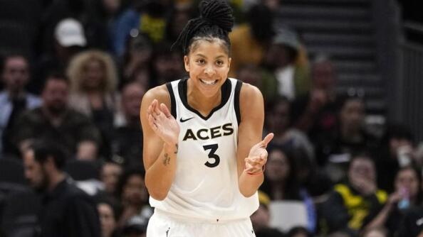 FILE - Las Vegas Aces forward Candace Parker reacts during the first half of a WNBA basketball game against the Seattle Storm, May 20, 2023, in Seattle. The three-time WNBA champion has announced she's retiring. Parker, a two-time league MVP, announced in a social media post on Sunday, April 28, 2024 that she's ending her career after 16 seasons. (AP Photo/Lindsey Wasson, File)