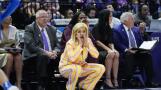 LSU Kim Mulkey calls out from the bench during the Tigers’ second-round college basketball game against Middle Tennessee.
