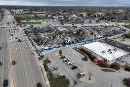 The developer of a planned apartment building with retail space on the southeast corner of Arlington Heights and Algonquin roads in Arlington Heights paid $9 million for the neighboring Guitar Center property, at bottom right, records show.