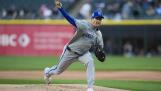 Kansas City Royals starting pitcher Seth Lugo throws against the Chicago White Sox during the first inning of a baseball game Monday, April 15, 2024, in Chicago. (AP Photo/Erin Hooley)