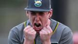 Stevenson’s Ben Fawcett celebrates after pitching in relief in a win over Mundelein last month. The two teams and Libertyville are battling tooth and nail for the NSC championship heading into the final few days of the regular season.