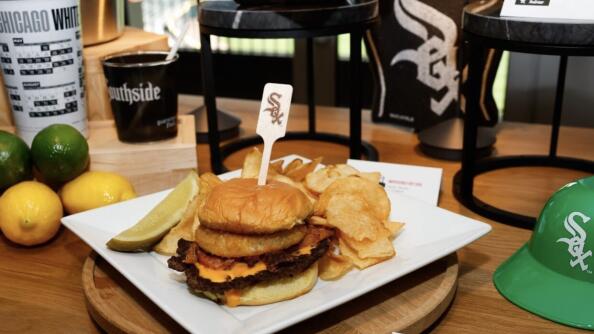 One of the new food offerings at Guaranteed Rate Field will be the smoke house smash burger, with pulled pork, BBQ sauce, beer cheese sauce and an onion ring, at the ChiSox Bar &amp; Grill.
